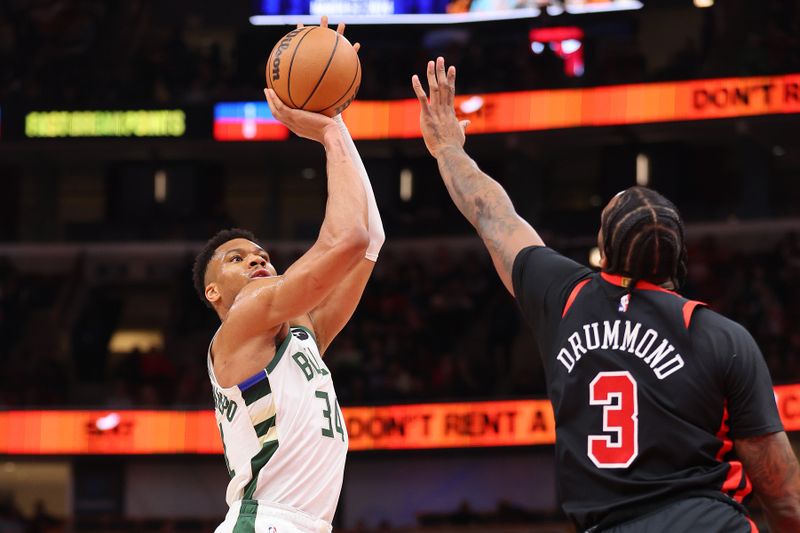 CHICAGO, ILLINOIS - MARCH 01: Giannis Antetokounmpo #34 of the Milwaukee Bucks shoots over Andre Drummond #3 of the Chicago Bulls during the first half at the United Center on March 01, 2024 in Chicago, Illinois. NOTE TO USER: User expressly acknowledges and agrees that, by downloading and or using this photograph, User is consenting to the terms and conditions of the Getty Images License Agreement. (Photo by Michael Reaves/Getty Images)