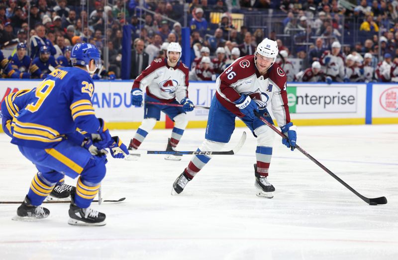 Dec 3, 2024; Buffalo, New York, USA;  Colorado Avalanche right wing Mikko Rantanen (96) looks to take a shot on goal during the third period against the Buffalo Sabres at KeyBank Center. Mandatory Credit: Timothy T. Ludwig-Imagn Images