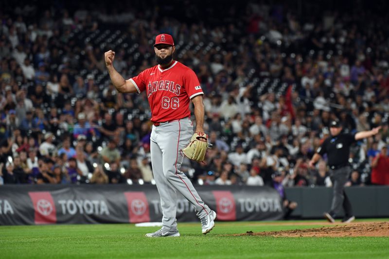 Sep 20, 2025; Denver, Colorado, USA; Los Angeles Angels pitcher Luis Garcia (66) celebrates after a win against the Colorado Rockies at Coors Field. Mandatory Credit: Christopher Hanewinckel-Imagn Images