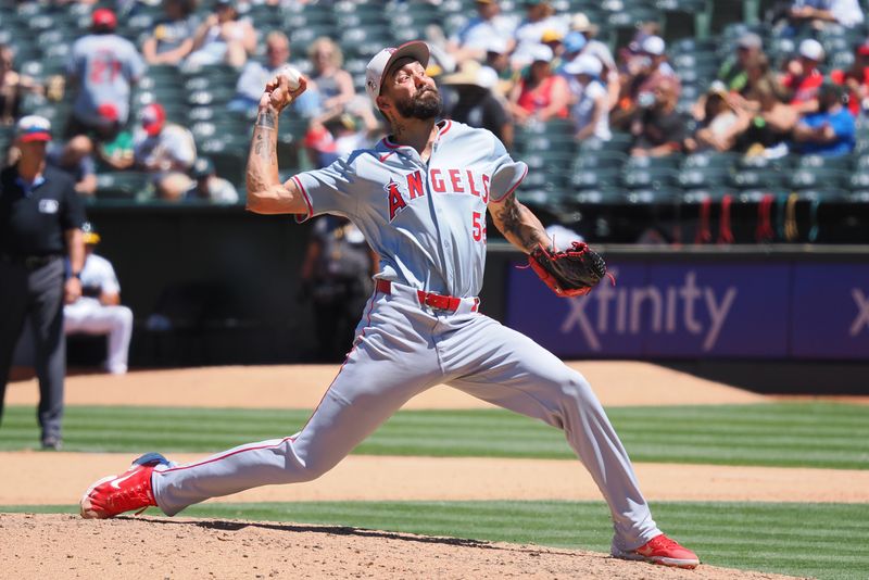 Jul 4, 2024; Oakland, California, USA; Los Angeles Angels relief pitcher Hans Crouse (52) pitches the ball against the Oakland Athletics during the fifth inning at Oakland-Alameda County Coliseum. Mandatory Credit: Kelley L Cox-USA TODAY Sports