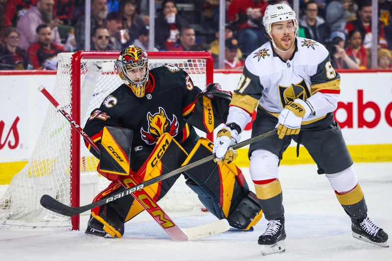 Mar 14, 2024; Calgary, Alberta, CAN; Calgary Flames goaltender Dustin Wolf (32) guards his net against Vegas Golden Knights during the first period at Scotiabank Saddledome. Mandatory Credit: Sergei Belski-USA TODAY Sports