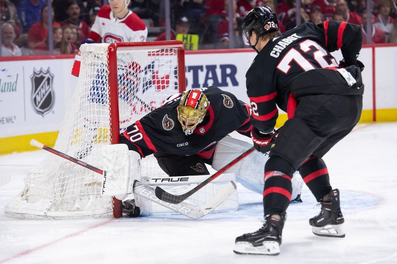 Apr 13, 2024; Ottawa, Ontario, CAN; Ottawa Senators goalie Joonas Korpisalo (70) makes a save in the second period against the Montreal Canadiens at the Canadian Tire Centre. Mandatory Credit: Marc DesRosiers-USA TODAY Sports