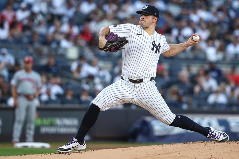 Jul 3, 2024; Bronx, New York, USA; New York Yankees starting pitcher Carlos Rodón (55) pitches in the first inning against the Cincinnati Reds at Yankee Stadium. Mandatory Credit: Wendell Cruz-USA TODAY Sports