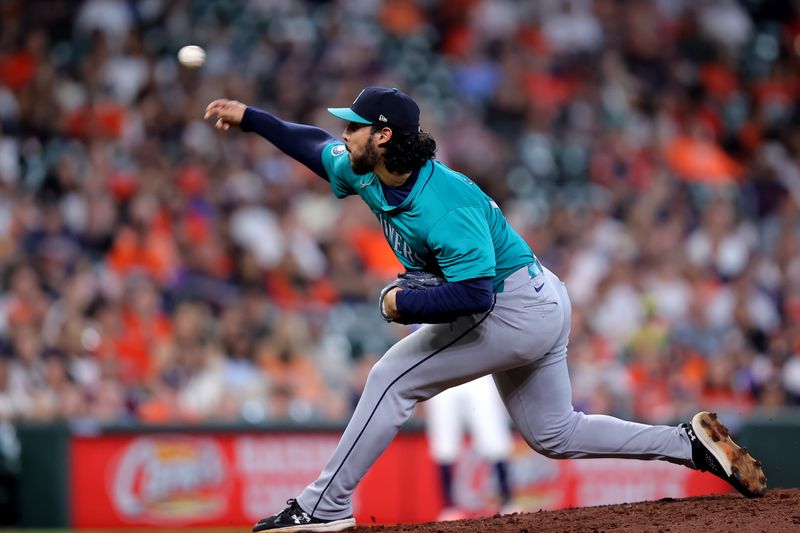 May 5, 2024; Houston, Texas, USA; Seattle Mariners pitcher Andres Munoz (75) delivers a pitch against the Houston Astros during the ninth inning at Minute Maid Park. Mandatory Credit: Erik Williams-USA TODAY Sports