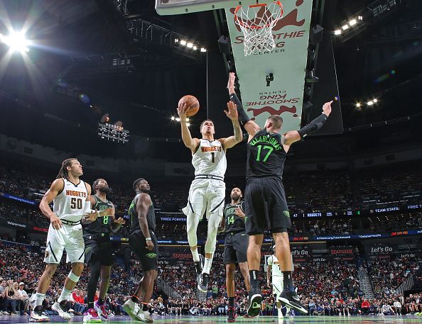 NEW ORLEANS, LA - NOVEMBER 17: Michael Porter Jr. #1 of the Denver Nuggets drives to the basket during the game against the New Orleans Pelicans during the In-Season Tournament on November 17, 2023 at the Smoothie King Center in New Orleans, Louisiana. NOTE TO USER: User expressly acknowledges and agrees that, by downloading and or using this Photograph, user is consenting to the terms and conditions of the Getty Images License Agreement. Mandatory Copyright Notice: Copyright 2023 NBAE (Photo by Layne Murdoch Jr./NBAE via Getty Images)