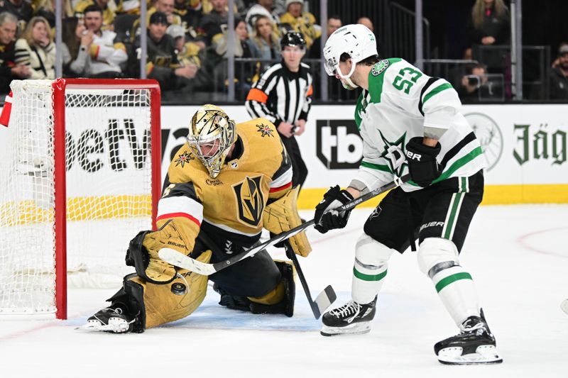 Apr 27, 2024; Las Vegas, Nevada, USA; Vegas Golden Knights goaltender Logan Thompson (36) stops a shot from Dallas Stars center Wyatt Johnston (53) in the second period in game three of the first round of the 2024 Stanley Cup Playoffs at T-Mobile Arena. Mandatory Credit: Candice Ward-USA TODAY Sports