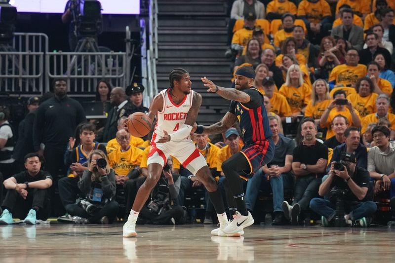 SAN FRANCISCO, CA - APRIL 28: Jalen Green #4 of the Houston Rockets looks to pass the ball during the game against the Golden State Warriors during Round 1 Game 4 of the 2025 NBA Playoffs on February 1, 2025 at Chase Center in San Francisco, California. NOTE TO USER: User expressly acknowledges and agrees that, by downloading and or using this photograph, user is consenting to the terms and conditions of Getty Images License Agreement. Mandatory Copyright Notice: Copyright 2025 NBAE (Photo by Jesse D. Garrabrant/NBAE via Getty Images)