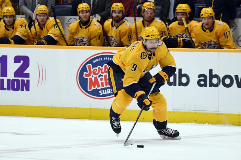 Feb 27, 2024; Nashville, Tennessee, USA; Nashville Predators left wing Filip Forsberg (9) skates the puck into the offensive zone during the first period against the Ottawa Senators at Bridgestone Arena. Mandatory Credit: Christopher Hanewinckel-USA TODAY Sports