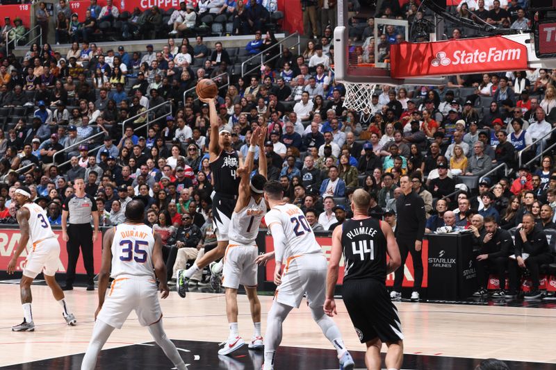 LOS ANGELES, CA - APRIL 10: Brandon Boston Jr. #4 of the LA Clippers shoots the ball during the game against the Phoenix Suns on April 10, 2024 at Crypto.Com Arena in Los Angeles, California. NOTE TO USER: User expressly acknowledges and agrees that, by downloading and/or using this Photograph, user is consenting to the terms and conditions of the Getty Images License Agreement. Mandatory Copyright Notice: Copyright 2024 NBAE (Photo by Adam Pantozzi/NBAE via Getty Images)