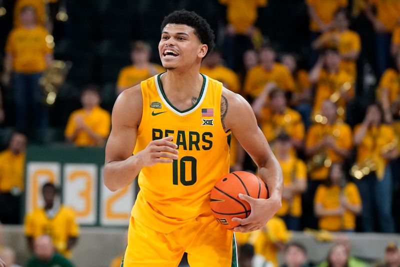 Jan 13, 2024; Waco, Texas, USA; Baylor Bears guard RayJ Dennis (10) calls out a play during the second half against the Cincinnati Bearcats at Paul and Alejandra Foster Pavilion. Mandatory Credit: Raymond Carlin III-USA TODAY Sports