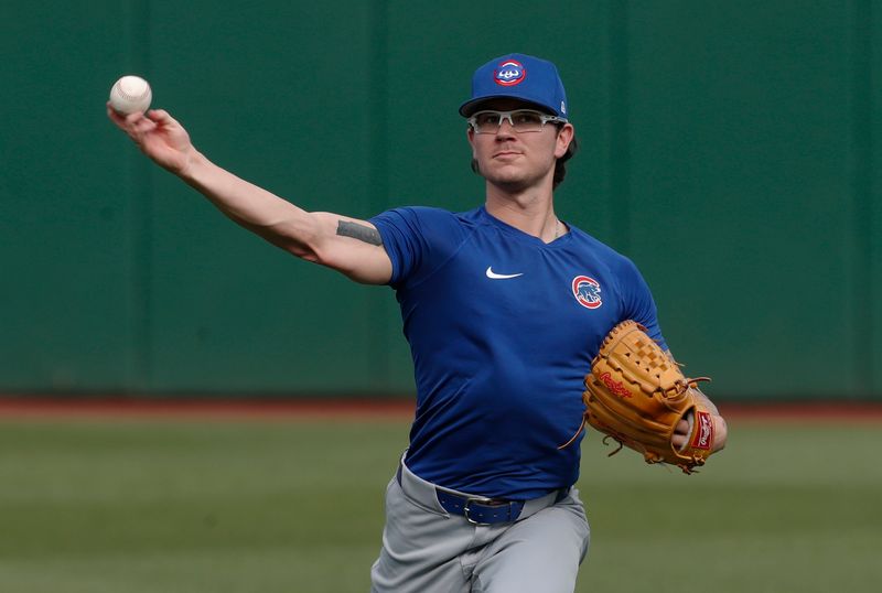 Aug 26, 2024; Pittsburgh, Pennsylvania, USA; Chicago Cubs relief pitcher Ethan Roberts (39) throws in the outfield before a game against the Pittsburgh Pirates at PNC Park. Mandatory Credit: Charles LeClaire-USA TODAY Sports