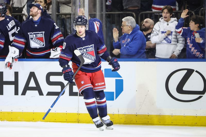 Jan 26, 2025; New York, New York, USA;  New York Rangers left wing Artemi Panarin (10) circles back to center ice after scoring a goal in the third period against the Colorado Avalanche at Madison Square Garden. Mandatory Credit: Wendell Cruz-Imagn Images