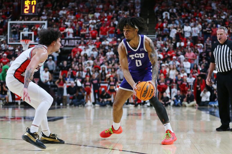 Feb 20, 2024; Lubbock, Texas, USA;  TCU Horned Frogs guard Micah Peavy (0) looks for an opening against Texas Tech Red Raiders guard Pop Isaacs (2) in the first half at United Supermarkets Arena. Mandatory Credit: Michael C. Johnson-USA TODAY Sports