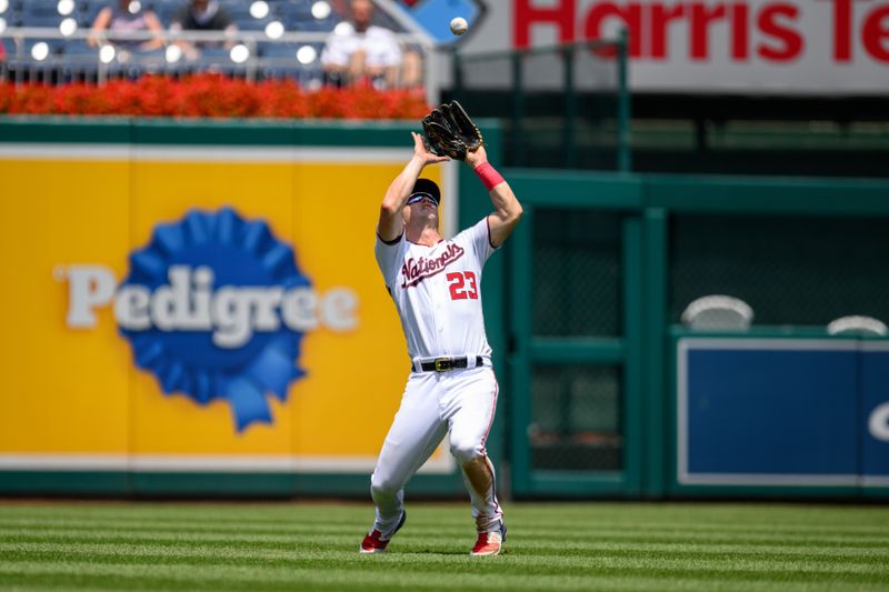 Jul 26, 2023; Washington, District of Columbia, USA; Washington Nationals left fielder Corey Dickerson (23) catches a fly ball during the sixth inning against the Colorado Rockies at Nationals Park. Mandatory Credit: Reggie Hildred-USA TODAY Sports