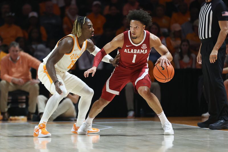 Mar 1, 2025; Knoxville, Tennessee, USA; Alabama Crimson Tide guard Mark Sears (1) moves the ball against Tennessee Volunteers guard Jahmai Mashack (15) during the first half at Thompson-Boling Arena at Food City Center. Mandatory Credit: Randy Sartin-Imagn Images