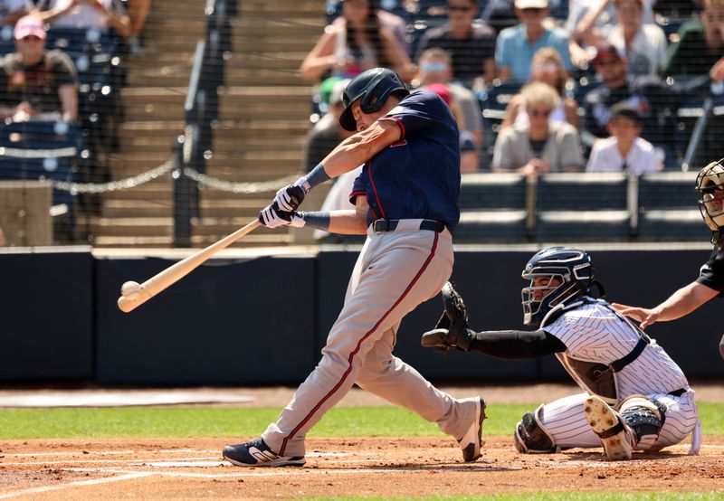 Mar 10, 2024; Tampa, Florida, USA; Atlanta Braves catcher Sean Murphy (12) hits a three RBI double during the first inning against the New York Yankees at George M. Steinbrenner Field. Mandatory Credit: Kim Klement Neitzel-USA TODAY Sports