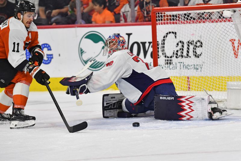 Apr 16, 2024; Philadelphia, Pennsylvania, USA; Washington Capitals goaltender Charlie Lindgren (79) makes a save against Philadelphia Flyers right wing Travis Konecny (11) during the second period at Wells Fargo Center. Mandatory Credit: Eric Hartline-USA TODAY Sports