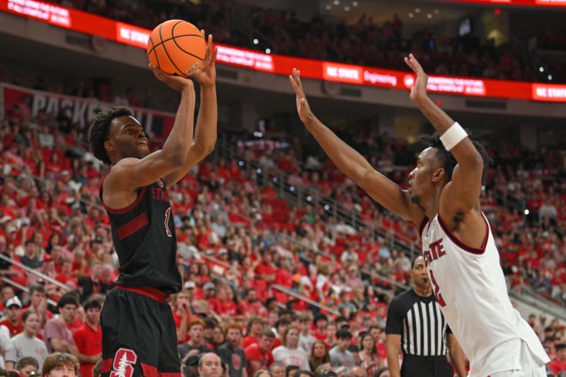 Mar 7, 2026; Raleigh, North Carolina, USA;  Stanford Cardinal guard Ebuka Okorie (1) shoots the ball against NC State Wolfpack guard Paul McNeil Jr. (2) during the second half at Lenovo Center. Mandatory Credit: Zachary Taft-Imagn Images