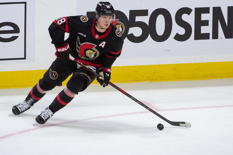 Mar 12, 2024; Ottawa, Ontario, CAN; Ottawa Senators center Tim Stutzle (18) skates with the puck in the third period against the Pittsburgh Penguins at the Canadian Tire Centre. Mandatory Credit: Marc DesRosiers-USA TODAY Sports