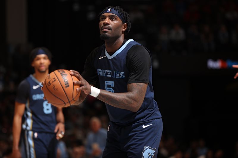 MEMPHIS, TN - FEBRUARY 14: Vince Williams Jr. #5 of the Memphis Grizzlies shoots a free throw during the game against the Houston Rockets on February 14, 2024 at FedExForum in Memphis, Tennessee. NOTE TO USER: User expressly acknowledges and agrees that, by downloading and or using this photograph, User is consenting to the terms and conditions of the Getty Images License Agreement. Mandatory Copyright Notice: Copyright 2024 NBAE (Photo by Joe Murphy/NBAE via Getty Images)