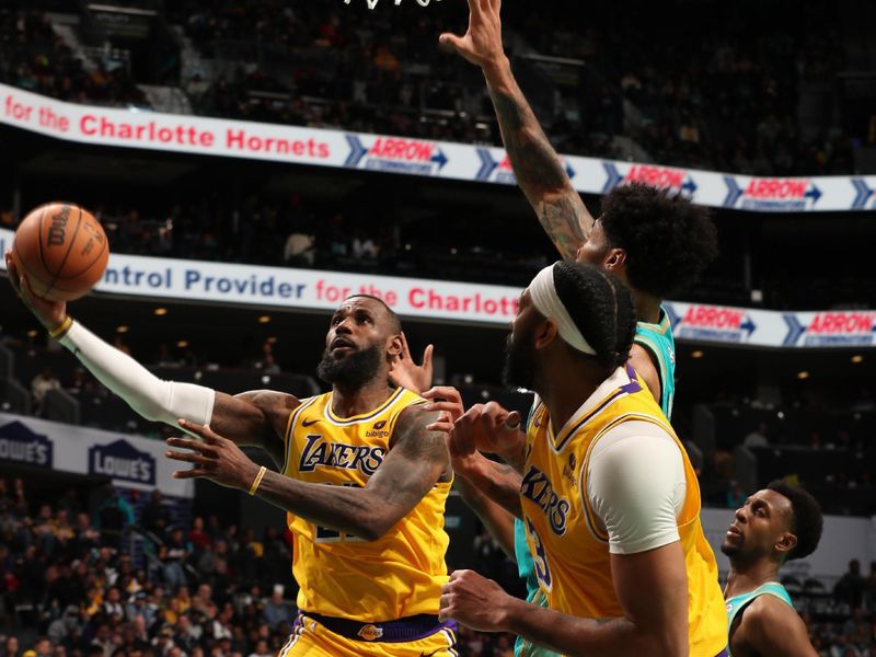 CHARLOTTE, NC - FEBRUARY 5: LeBron James #23 of the Los Angeles Lakers drives to the basket during the game against the Charlotte Hornets on February 5, 2024 at Spectrum Center in Charlotte, North Carolina. NOTE TO USER: User expressly acknowledges and agrees that, by downloading and or using this photograph, User is consenting to the terms and conditions of the Getty Images License Agreement. Mandatory Copyright Notice: Copyright 2024 NBAE (Photo by Kent Smith/NBAE via Getty Images)