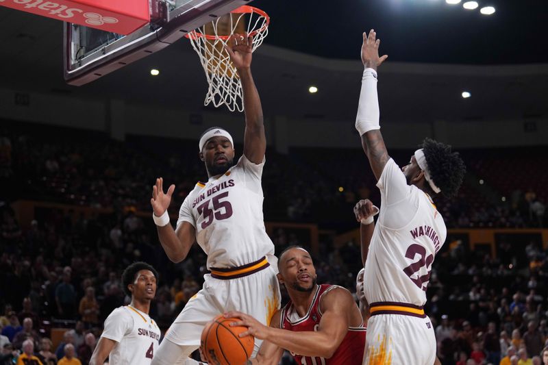 Feb 18, 2023; Tempe, Arizona, USA; Arizona State Sun Devils guard Devan Cambridge (35) and Arizona State Sun Devils forward Warren Washington (22) defend against Utah Utes guard Marco Anthony (10) during the first half at Desert Financial Arena. Mandatory Credit: Joe Camporeale-USA TODAY Sports