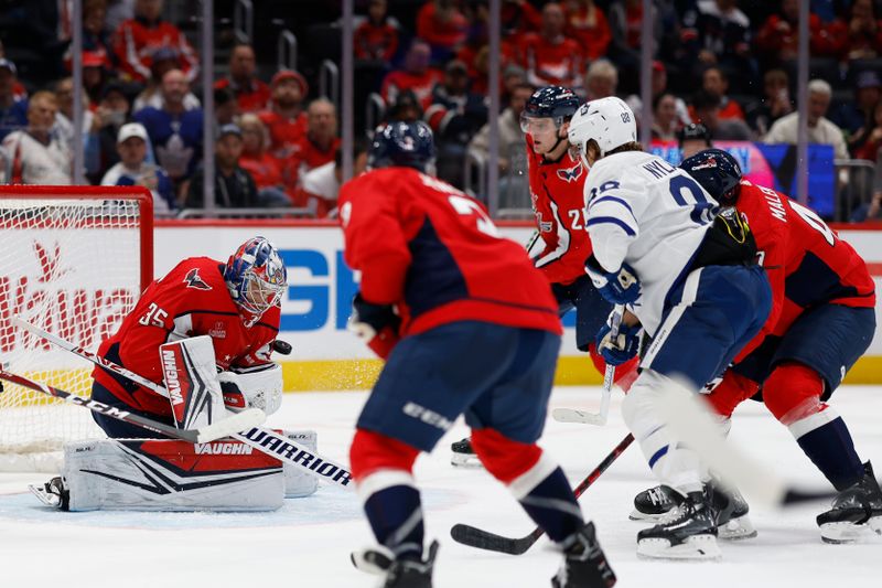 Oct 24, 2023; Washington, District of Columbia, USA; Washington Capitals goaltender Darcy Kuemper (35) makes a save on Toronto Maple Leafs right wing William Nylander (88) in the third period at Capital One Arena. Mandatory Credit: Geoff Burke-USA TODAY Sports