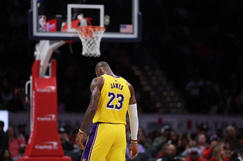 WASHINGTON, DC - APRIL 03: LeBron James #23 of the Los Angeles Lakers reacts against the Washington Wizards at Capital One Arena on April 03, 2024 in Washington, DC. NOTE TO USER: User expressly acknowledges and agrees that, by downloading and or using this photograph, User is consenting to the terms and conditions of the Getty Images License Agreement. (Photo by Patrick Smith/Getty Images)