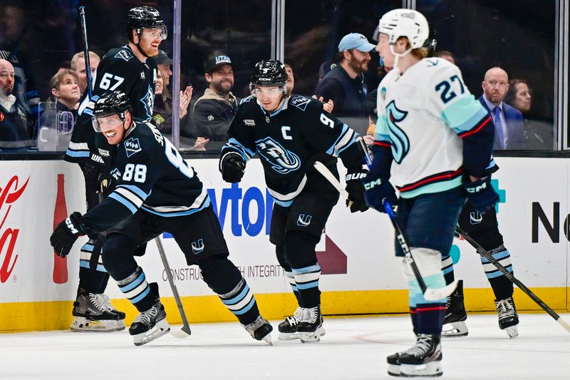 Jan 17, 2026; Salt Lake City, Utah, USA; Utah Mammoth defenseman Nate Schmidt (88) celebrates after a goal during the third period against the Seattle Kraken at Delta Center. Mandatory Credit: Peter Creveling-Imagn Images
