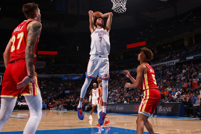 OKLAHOMA CITY, OK - OCTOBER 17: Chet Holmgren #7 of the Oklahoma City Thunder drives to the basket during the game against the Atlanta Hawks on October 17, 2024 at Paycom Arena in Oklahoma City, Oklahoma. NOTE TO USER: User expressly acknowledges and agrees that, by downloading and or using this photograph, User is consenting to the terms and conditions of the Getty Images License Agreement. Mandatory Copyright Notice: Copyright 2024 NBAE (Photo by Zach Beeker/NBAE via Getty Images)