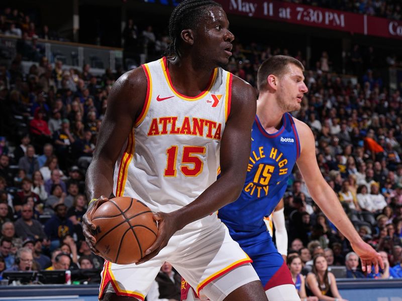 DENVER, CO - APRIL 6: Clint Capela #15 of the Atlanta Hawks rebounds the ball during the game against the Denver Nuggets on April 6, 2024 at the Ball Arena in Denver, Colorado. NOTE TO USER: User expressly acknowledges and agrees that, by downloading and/or using this Photograph, user is consenting to the terms and conditions of the Getty Images License Agreement. Mandatory Copyright Notice: Copyright 2024 NBAE (Photo by Garrett Ellwood/NBAE via Getty Images)