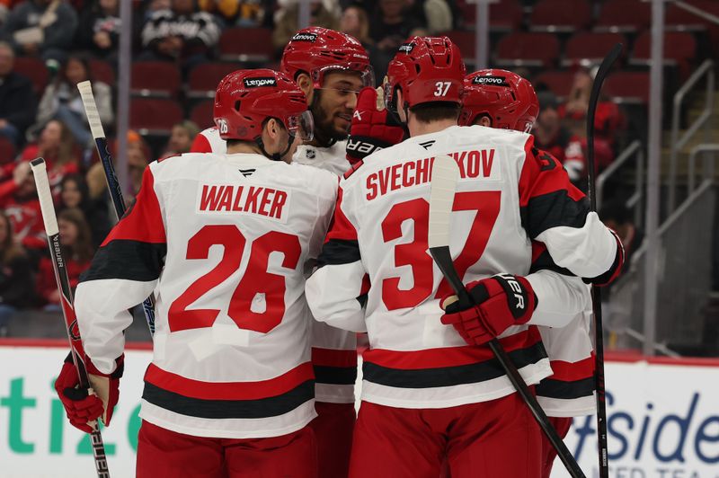 Jan 4, 2026; Newark, New Jersey, USA; Carolina Hurricanes left wing Nikolaj Ehlers (27) celebrates his goal against the New Jersey Devils during the first period at Prudential Center. Mandatory Credit: Ed Mulholland-Imagn Images