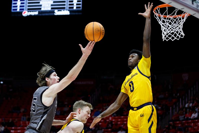 Feb 5, 2023; Salt Lake City, Utah, USA; Utah Utes center Branden Carlson (35) shoots against California Golden Bears forward Lars Thiemann (21) and guard Marsalis Roberson (0) in the second half at Jon M. Huntsman Center. Mandatory Credit: Jeffrey Swinger-USA TODAY Sports