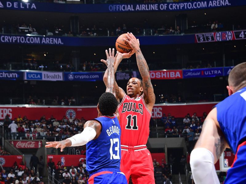 LOS ANGELES, CA - MARCH 9: DeMar DeRozan #11 of the Chicago Bulls shoots the ball during the game against the LA Clippers on March 9, 2024 at Crypto.Com Arena in Los Angeles, California. NOTE TO USER: User expressly acknowledges and agrees that, by downloading and/or using this Photograph, user is consenting to the terms and conditions of the Getty Images License Agreement. Mandatory Copyright Notice: Copyright 2024 NBAE (Photo by Adam Pantozzi/NBAE via Getty Images)