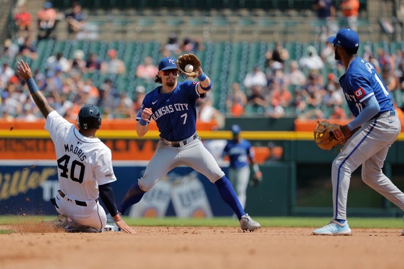 Aug 4, 2024; Detroit, Michigan, USA;  Kansas City Royals shortstop Bobby Witt Jr. (7) gets the throw from third baseman Maikel Garcia (11) to get Detroit Tigers outfielder Bligh Madris (40) out at second in the fourth inning at Comerica Park. Mandatory Credit: Rick Osentoski-USA TODAY Sports