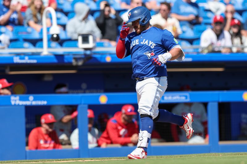 Mar 21, 2025; Dunedin, Florida, USA; Toronto Blue Jays catcher Alejandro Kirk (30) runs the bases after hitting a home run against the Philadelphia Phillies in the eighth inning during spring training at TD Ballpark. Mandatory Credit: Nathan Ray Seebeck-Imagn Images