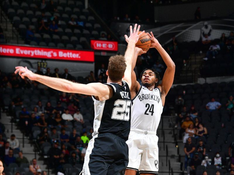 SAN ANTONIO, TX - JANUARY 17:  Cam Thomas #24 of the Brooklyn Nets shoots a three point basket during the game against the San Antonio Spurs on January 17, 2023 at the AT&T Center in San Antonio, Texas. NOTE TO USER: User expressly acknowledges and agrees that, by downloading and or using this photograph, user is consenting to the terms and conditions of the Getty Images License Agreement. Mandatory Copyright Notice: Copyright 2022 NBAE (Photos by Michael Gonzales/NBAE via Getty Images)