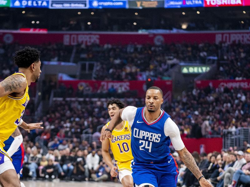 LOS ANGELES, CA - JANUARY 23:  Norman Powell #24 of the LA Clippers goes to the basket during the game on January 23, 2024 at Crypto.Com Arena in Los Angeles, California. NOTE TO USER: User expressly acknowledges and agrees that, by downloading and/or using this Photograph, user is consenting to the terms and conditions of the Getty Images License Agreement. Mandatory Copyright Notice: Copyright 2024 NBAE (Photo by Tyler Ross/NBAE via Getty Images)