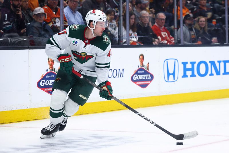 Mar 19, 2024; Anaheim, California, USA; Minnesota Wild defenseman Declan Chisholm (47) skates against the Anaheim Ducks during the second period of a game at Honda Center. Mandatory Credit: Jessica Alcheh-USA TODAY Sports