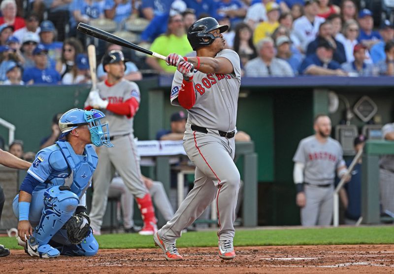May 10, 2025; Kansas City, Missouri, USA;  Boston Red Sox designated hitter Rafael Devers (11) hits an RBI double in the third inning against the Kansas City Royals at Kauffman Stadium. Mandatory Credit: Peter Aiken-Imagn Images