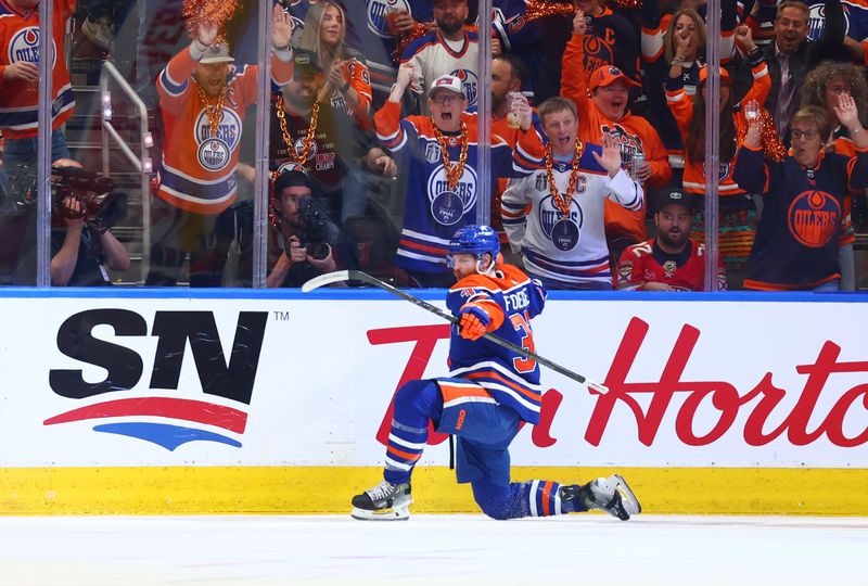 June 21, 2024; Edmonton, Alberta, CAN; Edmonton Oilers left wing Warren Foegele (37) celebrates after scoring a goal in the first period against the Florida Panthers in game six of the 2024 Stanley Cup Final at Rogers Place. Mandatory Credit: Sergei Belski-USA TODAY Sports