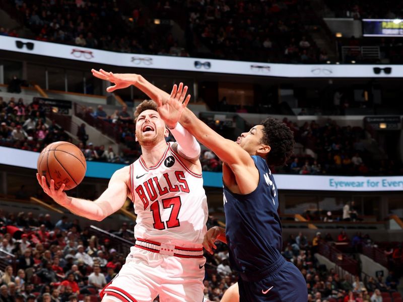 CHICAGO, IL - OCTOBER 19: Onuralp Bitim #17 of the Chicago Bulls drives to the basket during the game against the Minnesota Timberwolves on October 19, 2023 at United Center in Chicago, Illinois. NOTE TO USER: User expressly acknowledges and agrees that, by downloading and or using this photograph, User is consenting to the terms and conditions of the Getty Images License Agreement. Mandatory Copyright Notice: Copyright 2023 NBAE (Photo by Jeff Haynes/NBAE via Getty Images)