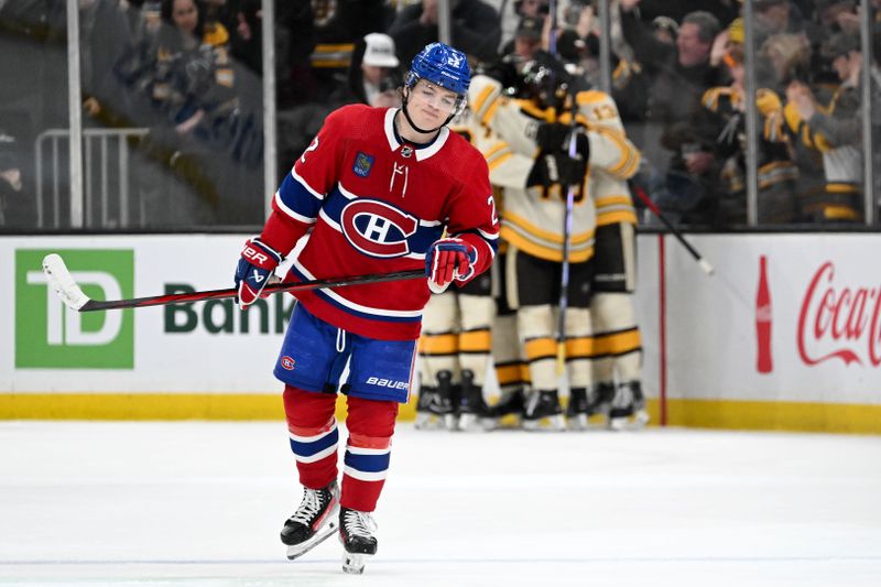 Jan 20, 2024; Boston, Massachusetts, USA; Montreal Canadiens right wing Cole Caufield (22) skates off of the ice after a goal by Boston Bruins center Charlie Coyle (13) during the second period at the TD Garden. Mandatory Credit: Brian Fluharty-USA TODAY Sports