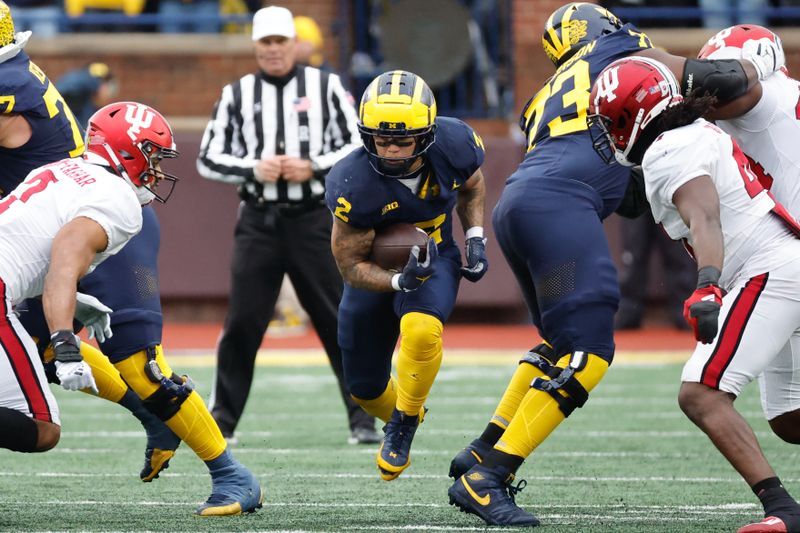 Oct 14, 2023; Ann Arbor, Michigan, USA; Michigan Wolverines running back Blake Corum (2) rushes in the first half against the Indiana Hoosiers at Michigan Stadium. Mandatory Credit: Rick Osentoski-USA TODAY Sports