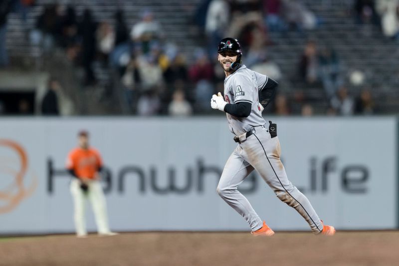 Apr 19, 2024; San Francisco, California, USA;  Arizona Diamondbacks designated hitter Blaze Alexander (9) runs the bases after hitting a grand slam against the San Francisco Giants during the eighth inning at Oracle Park. Mandatory Credit: John Hefti-USA TODAY Sports