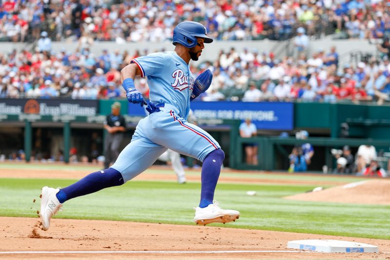 May 21, 2023; Arlington, Texas, USA; Texas Rangers center fielder Leody Taveras (3) runs home to score during the fifth inning against the Colorado Rockies at Globe Life Field. Mandatory Credit: Andrew Dieb-USA TODAY Sports