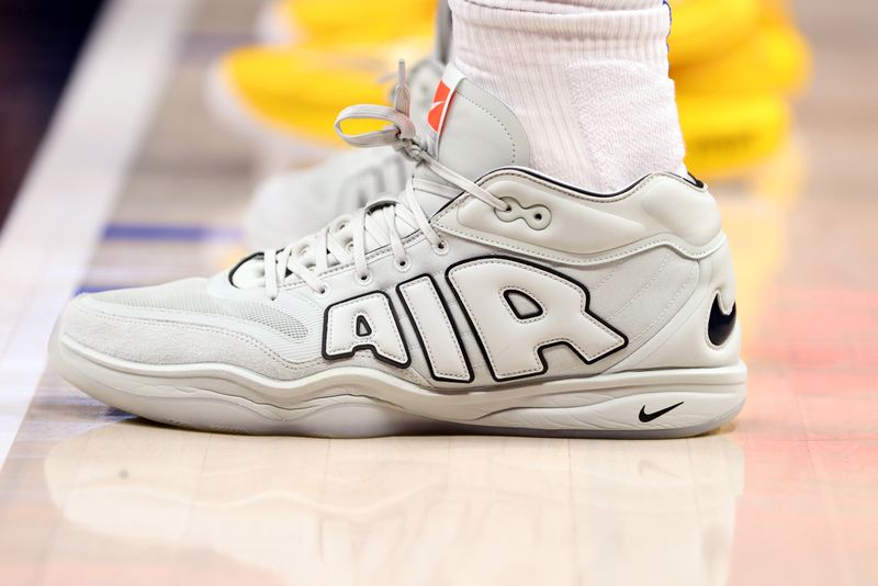 DALLAS, TEXAS - MARCH 13: A shot of the shoes of Daniel Gafford #21 of the Dallas Mavericks in the game against the Golden State Warriors at American Airlines Center on March 13, 2024 in Dallas, Texas. NOTE TO USER: User expressly acknowledges and agrees that, by downloading and or using this photograph, User is consenting to the terms and conditions of the Getty Images License Agreement. (Photo by Tim Heitman/Getty Images)