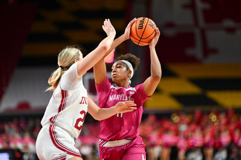 Jan 31, 2024; College Park, Maryland, USA;  Maryland Terrapins guard Jakia Brown-Turner (11) looks to pass as Indiana Hoosiers guard Chloe Moore-McNeil (22) defends during the second half at Xfinity Center. Mandatory Credit: Tommy Gilligan-USA TODAY Sports