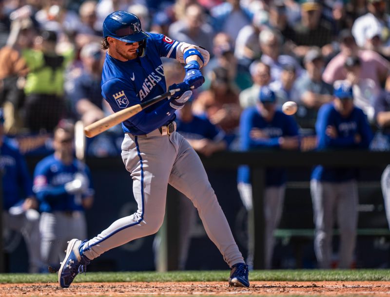 May 15, 2024; Seattle, Washington, USA; Kansas City Royals shortstop Bobby Witt Jr. (7) hits a sacrifice fly to score a run during the sixth inning against the Seattle Mariners at T-Mobile Park. Mandatory Credit: Stephen Brashear-USA TODAY Sports