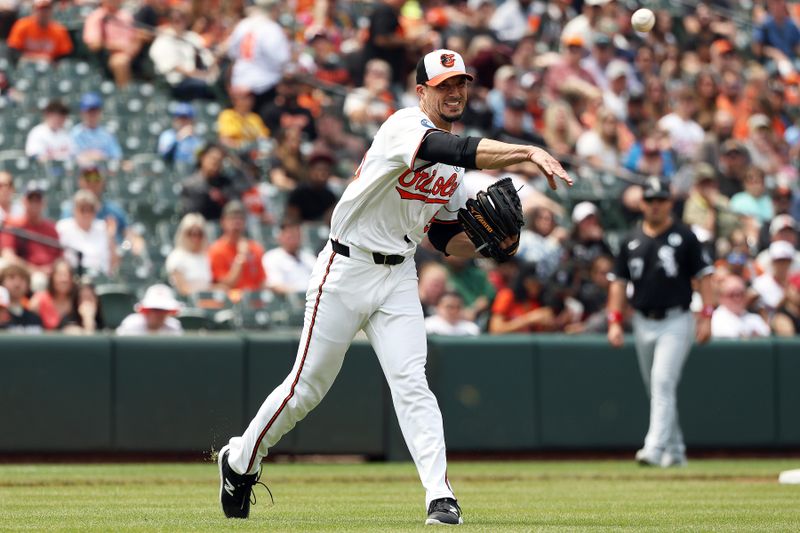 Jun 1, 2025; Baltimore, Maryland, USA; Baltimore Orioles pitcher Charlie Morton (50) throws to first for an out during the fourth inning against the Chicago White Sox at Oriole Park at Camden Yards. Mandatory Credit: Daniel Kucin Jr.-Imagn Images